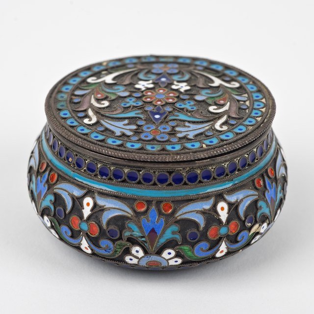 Russian silver and enamel box: Russian silver and enamel box: Late 19th c., maker's mark on inside rim of cover, 88 zolotnik mark on base, 1.25"h x 2.25"dia., approx. 2 ozt. - Condition Report: overall good/fair, two repairs to ena