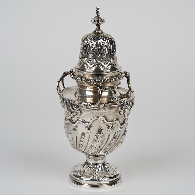 Edwardian for Tiffany & Co. sterling silver caste: Edwardian for Tiffany & Co. sterling silver caster: London, circa 1901, maker's mark "WC", inscribed on foot "Made in England for Tiffany & Co.", 9"h x 4"dia., approx. 15.1 ozt. - Condition Report: ov