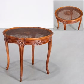 Louis XV style walnut gueridon, caned top