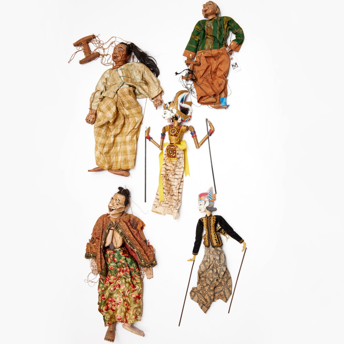 Group Javanese golek puppets, ex Philip Pearlstein: Group Javanese golek puppets, ex Philip Pearlstein, 20th c., Indonesia, (5) puppets, polychrome painted and carved wood, in fabric costumes, 28"h x 13"w (largest), 22" x 7.5"w (smallest) Provenance: T