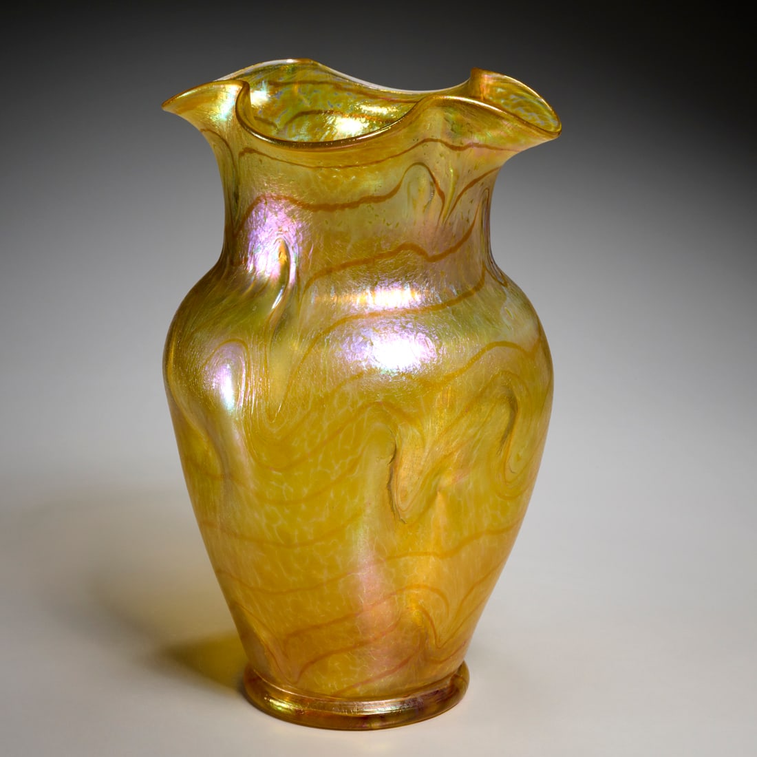 Loetz (attrib.) large art glass vase, ex Sotheby's: Loetz (attrib.) large art glass vase, ex Sotheby's, c. 1900, ruffled rim and pinched ovoid body, yellow and amber tones, no visible signature, 14.75"h x 9"w Provenance: A Private Collection: 550 Park