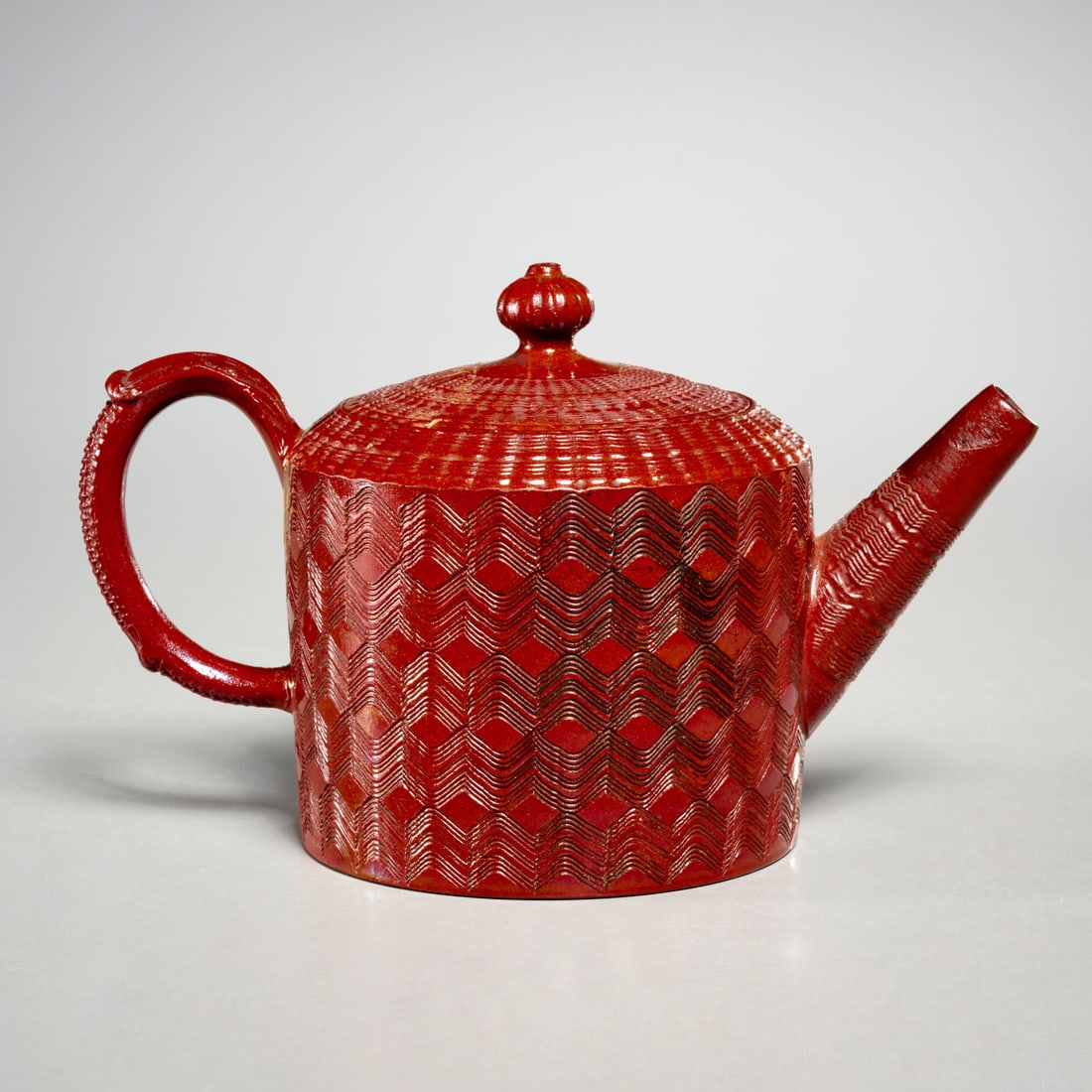 Elers ware (attrib.) pottery teapot, ex museum: Elers ware (attrib.) pottery teapot, ex museum, 17th/18th c., England, redware teapot with engine turned decoration, seal stamp to underside, museum accession number, 5"h x 7.5"l x 4"w Provenance: Sol