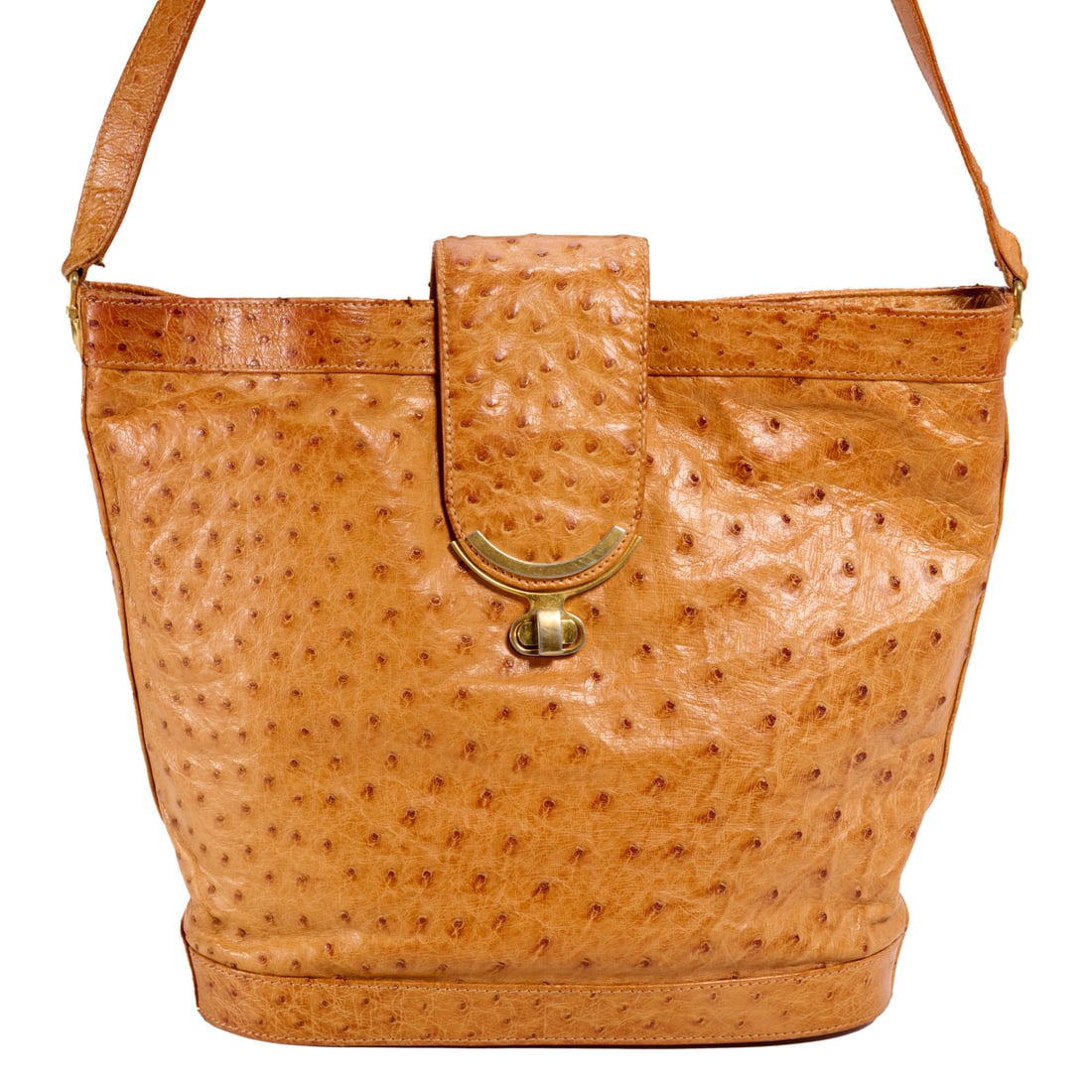 Mark Cross ostrich handbag: Mark Cross ostrich handbag, c. 1960s, cognac with gold hardware, adjustable shoulder strap, interior zipper pocket, interior and strap buckle stamped, approx. 9"h, 12"w Provenance: The Estate of Barba