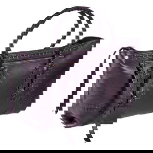 Alexander McQueen whipstitch folk tote bag: Alexander McQueen whipstitch folk tote bag, 21st. c., in deep eggplant, with rolled handles, zip top closure with tassel, outside zipper pocket, canvas interior with pockets, authenticity card, logo e