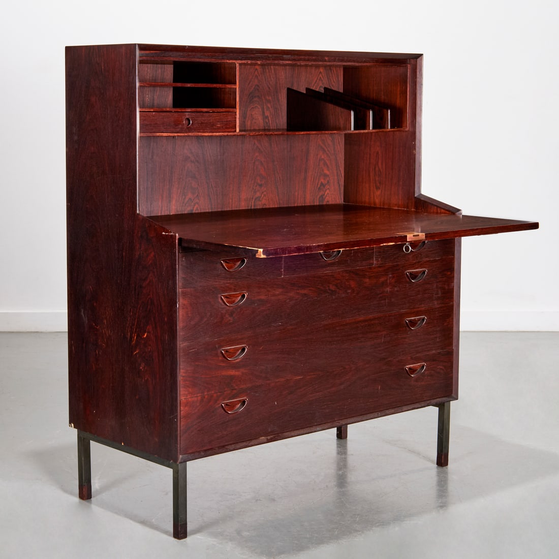 Peter & Molgaard Hvidt, rare rosewood secretary: Peter & Molgaard Hvidt, rare rosewood secretary, c. 1956, Denmark, rosewood veneer, brass hinges, black metal legs with rosewood feet, the hinged upper door opening to writing surface with fitted draw