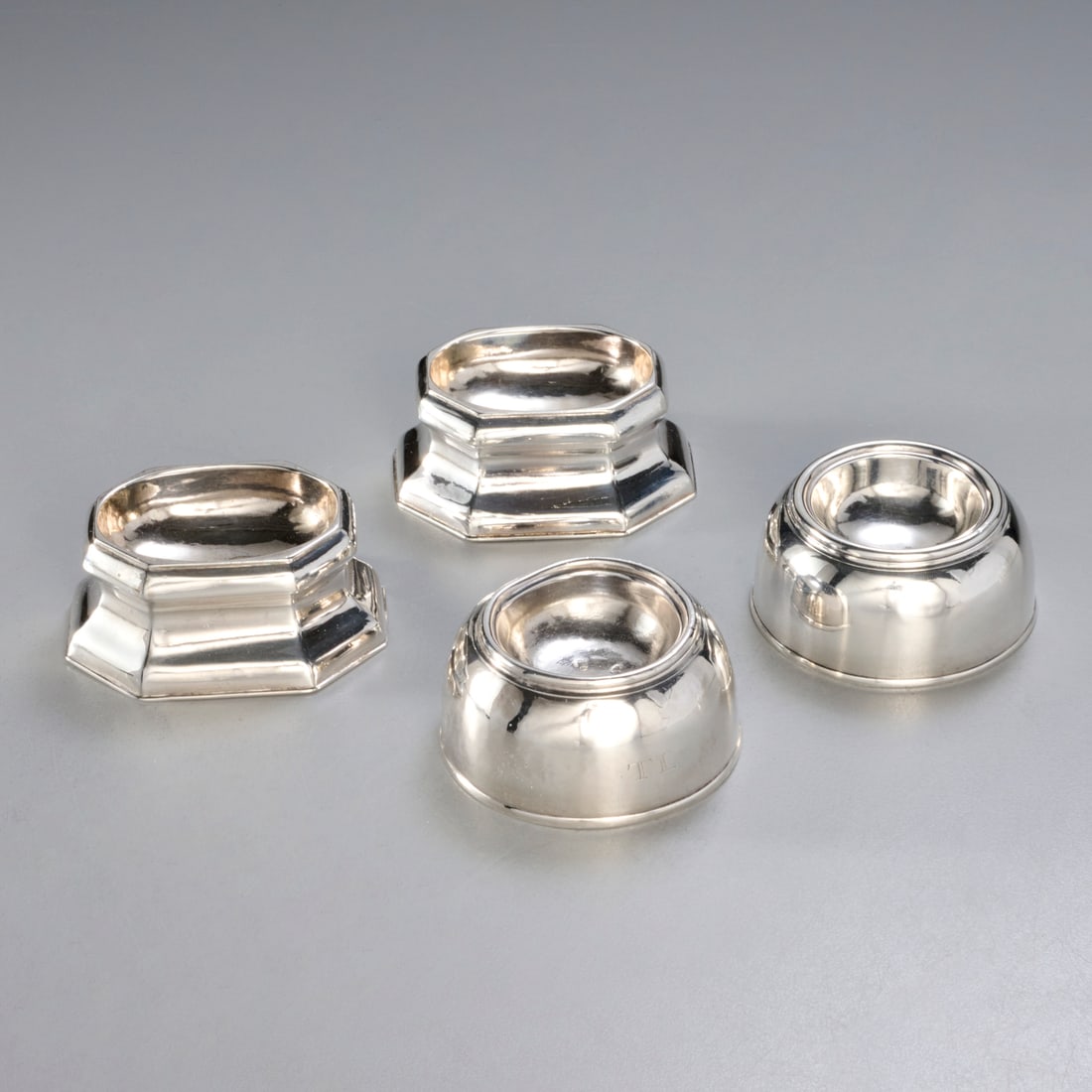 (2) Pairs George I/II trencher salts, ex museum: (2) Pairs George I/II trencher salts, ex museum, London, letter dated 1714 and 1730, maker's marks of William Looker and Edward Wood, one domed pair, 1.5"h x 3"dia; and one octagonal pair, 1.5"h x 3"l
