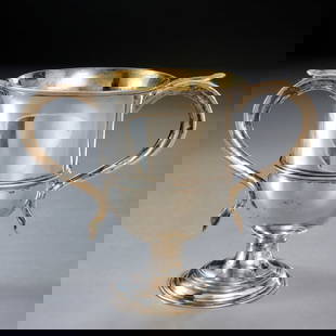 George III silver cup, Hester Bateman, ex museum: George III silver cup, Hester Bateman, ex museum, London, letter dated 1785, maker's mark of Hester Bateman, sterling silver with gold wash bowl, baluster form on round spreading foot, scroll handles,