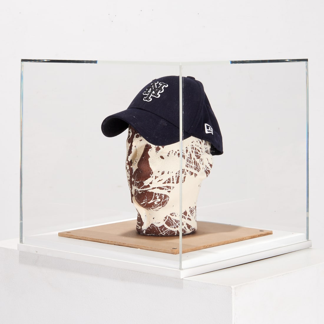 Kelley Walker, pulp and chocolate sculpture, 2010: Kelley Walker, pulp and chocolate sculpture, 2010, Kelley Walker (American, b. 1969), Untitled (bust), paper pulp and chocolate cast, New York Mets cap worn by artist, resin case, edition 33/35, unsig