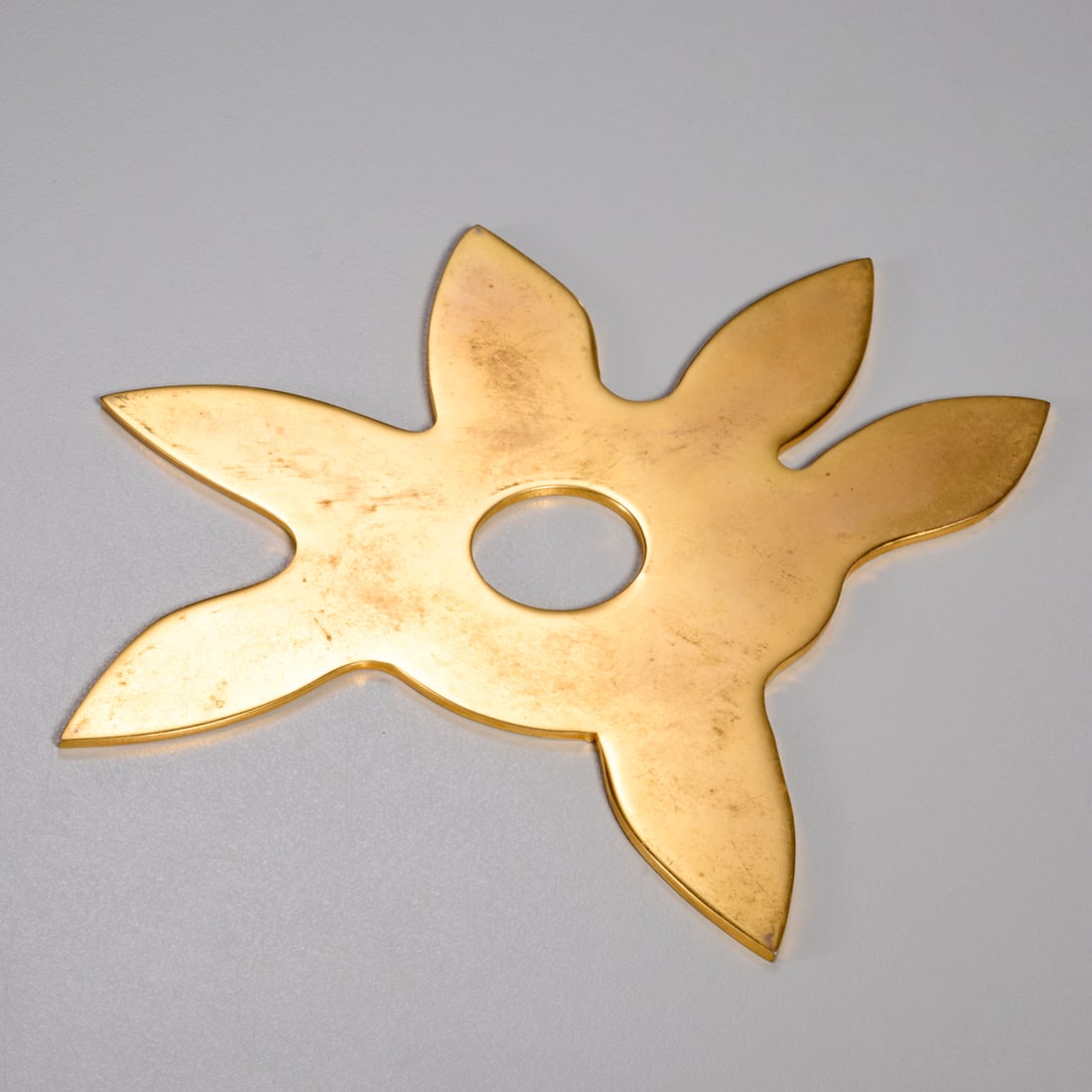 Jean Arp (after), gilt bronze sculpture, 1968: Jean Arp (after), gilt bronze sculpture, 1968, After Jean Arp (French, 1886-1966), "Etoile", unsigned, from an edition of 300 (usually signed on paper justification), approx. 7"dia Provenance: A Priva