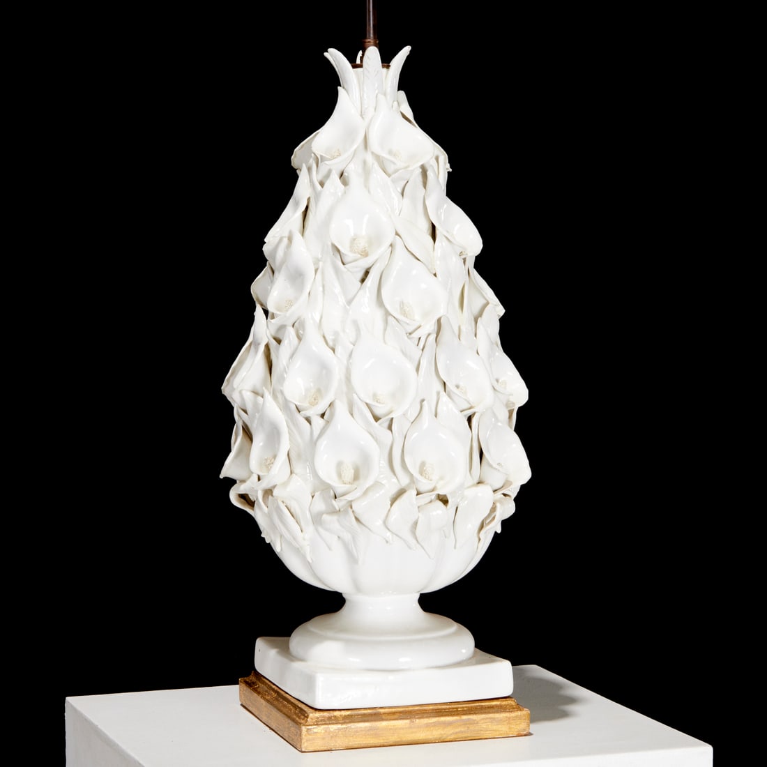 Large Italian blanc de chine lily topiary lamp: Large Italian blanc de chine lily topiary lamp, 20th c., pyramidal tower of lilies in urn, giltwood base, no visible marks, 36.5"h x 11.5"w (total) Provenance: Property from LuShan Farm, Chester, NJ