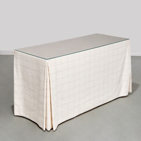 Custom draped table, sourced by Mark Hampton