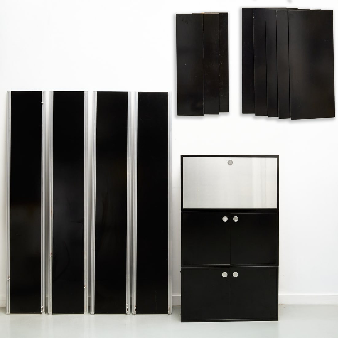 Willy Rizzo, wall unit components: Willy Rizzo, wall unit components, c. 1970s, Italy, for Cidue Modulable, black laminate, aluminum, chrome, brass hardware, incomplete, with (4) standards, (3) cabinets, and (5) larger shelves, (3) sma