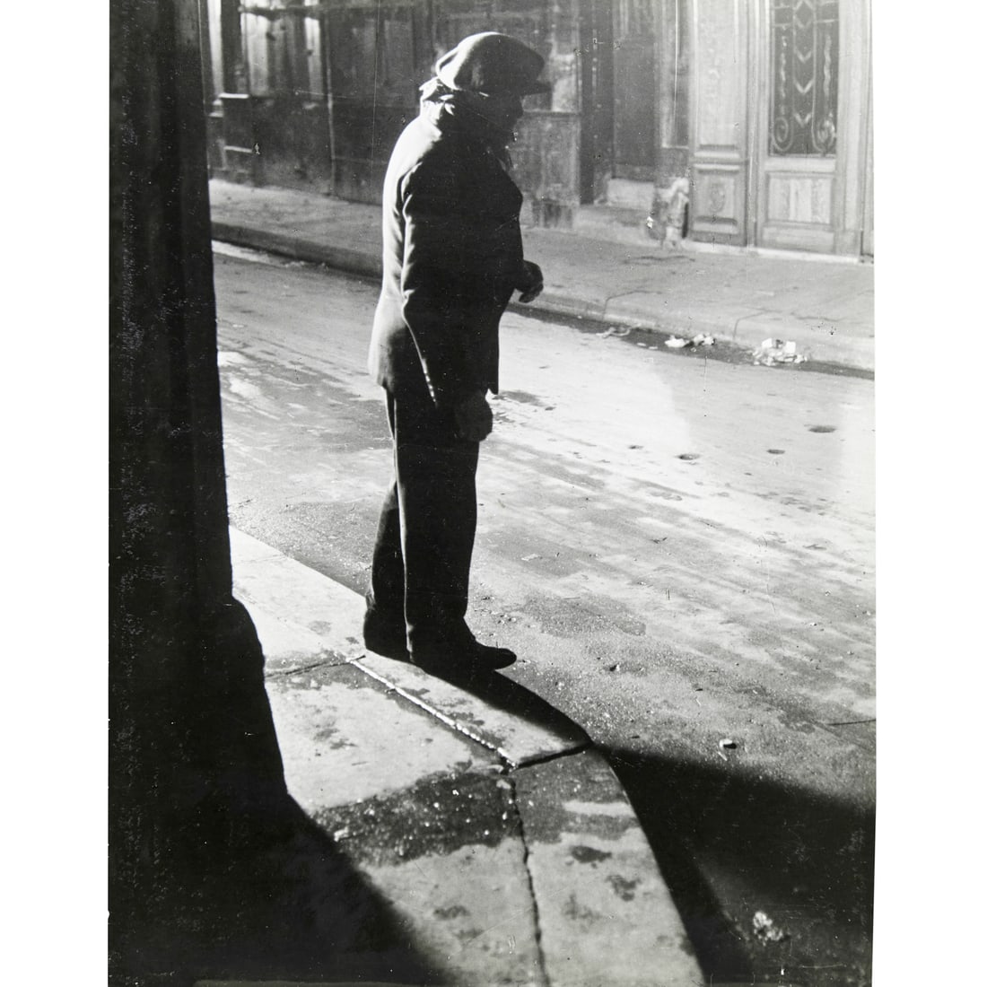 Brassai, signed photograph, c. 1932: Brassai, signed photograph, c. 1932, Brassai (Gyula Halasz) (French, 1899-1984), Escaped Convict, Rue de la Ferronniere, Les Halles, from Paris at Night series, likely printed c. 1970, glossy finish,