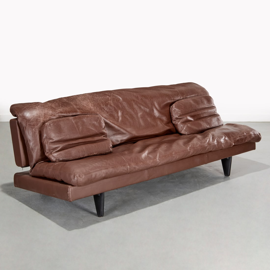 De Sede, Ernst Ambuhler, leather sleeper sofa: De Sede, Ernst Ambuhler, leather sleeper sofa, 1970s, Switzerland, Model DS169, manufacturer's button tag to side, 28"h x 78"w x 31"d (sofa orientation)