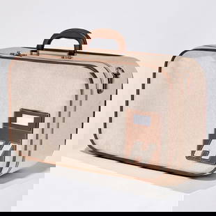 Hermes, tan UL53 suitcase, 2009: Hermes, tan UL53 suitcase, 2009, An etoupe clemence leather & toile suitcase with barenia leather & herringbone toile interior and palladium hardware, includes lock, keys, shoulder strap, dustbag, and