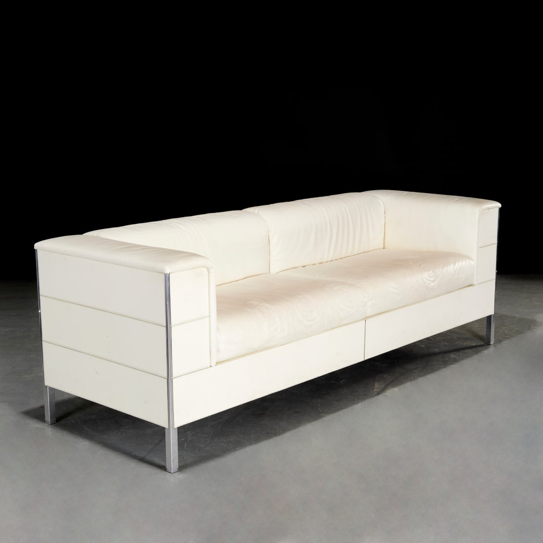 Poltrona Frau, white leather "Talus" sofa: Poltrona Frau, white leather "Talus" sofa, 20th/21st c., Italy, stitch paneled sides and back, manufacturer's tag and embossed mark, 28.5"h x 87.5"w x 30"d