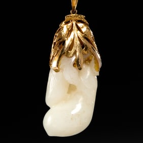 Chinese gold mounted carved jade pendant