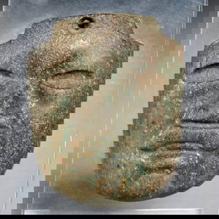 Pre-Columbian Olmec stone pectoral: Pre-Columbian Olmec stone pectoral, Probably 900-500 BCE, possibly Tabasco, Mexico, carved green stone on acrylic stand, face with "jaguar mouth", incl. redacted provenance documents, 5.5"h x 3.25"w x