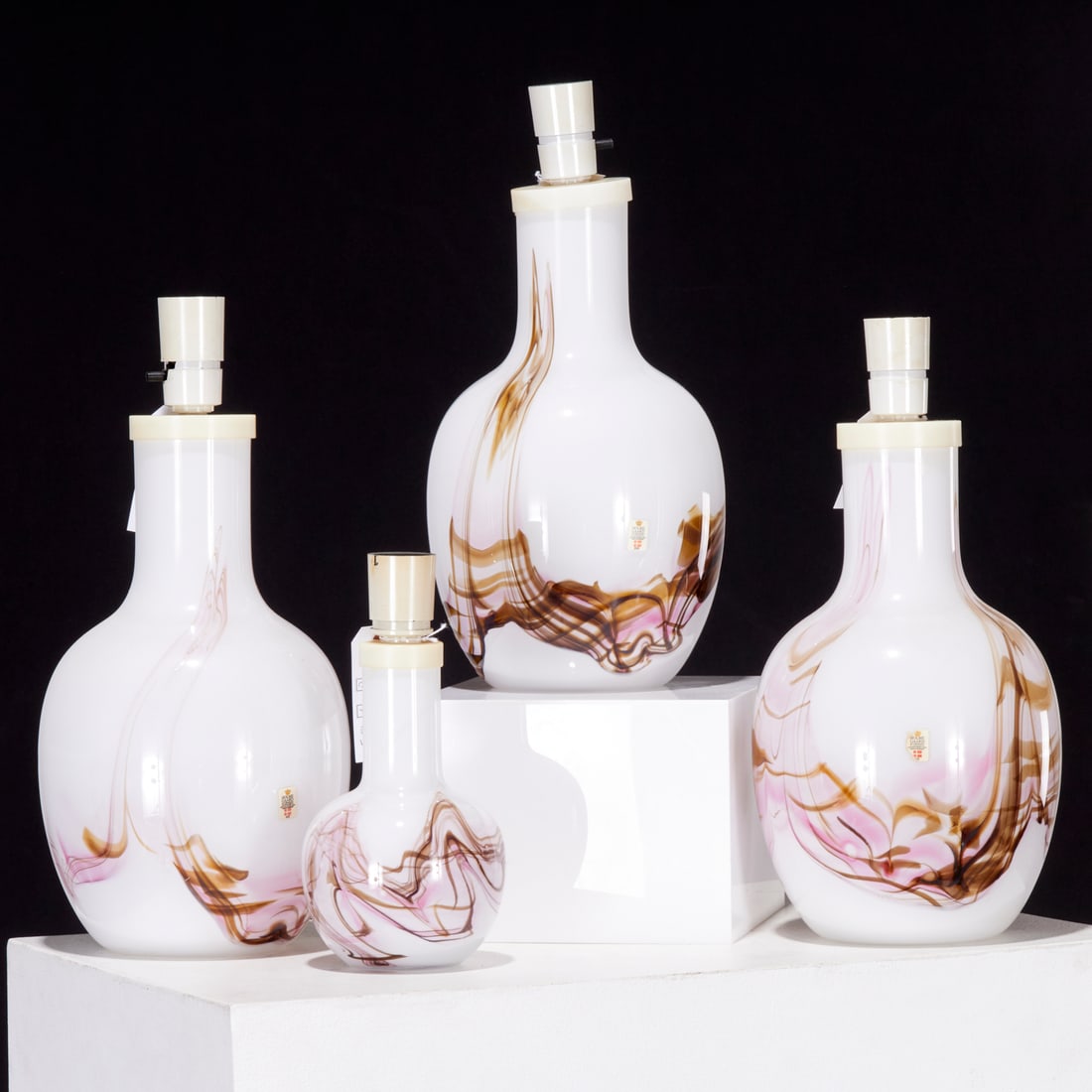 Michel Bang for Holmegaard, (4) Sakura table lamps: Michel Bang for Holmegaard, (4) Sakura table lamps, Late 20th c., Denmark, assorted sizes, some with remnant sticker labels, largest: 15.75"h x 7.5"w (total), smallest: 10"h x 5"w (total)