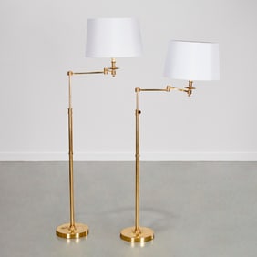 Pair articulated brass floor lamps