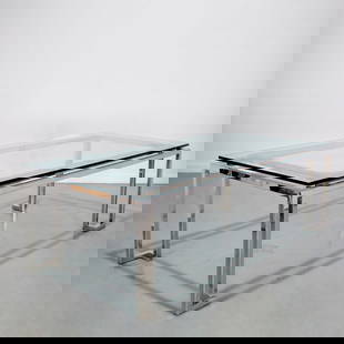 Modern floating glass top chrome dining table: Modern floating glass top chrome dining table, 20th c., rectangular 1-inch thick glass top, unmarked, 29.25"h x 92"l x 42"w Provenance: The Collection of Placido Domingo