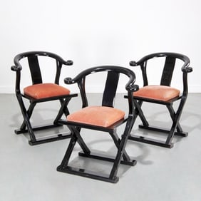 Manner of James Mont, (3) black lacquered chairs