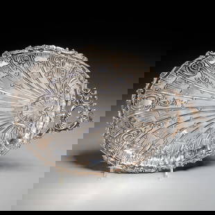 French silver footed dish: French silver footed dish, 20th c., stylized shell form, with openwork scrolled handle, maker's mark "E.F." (possibly Emile Faivre), with another rubbed mark (possibly Boar's Head .800 silver guarante