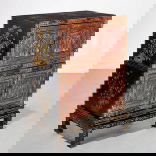 Chinese Export stacked cabinet on stand: Chinese Export stacked cabinet on stand, 20th c., black and red lacquer, with raised figural panel doors, 15.5"h x 27.5"w x 16.25"d (each cabinet), 39.5"h x 29.5"w x 18.25"d (stacked and incl. stand)