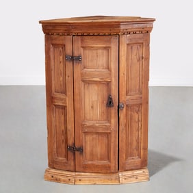 Antique paneled pine corner cabinet