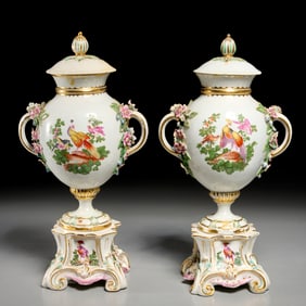 Pair Chelsea porcelain urns and stands