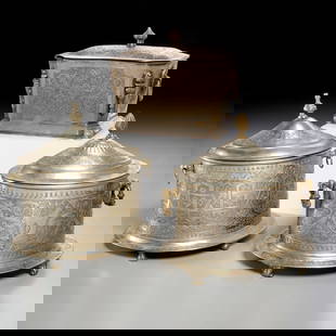 (3) Antique Moroccan engraved metal caskets: (3) Antique Moroccan engraved metal caskets, 19th/20th c., silver plate or white metal, possibly tea caddies, each stamped in Arabic underneath, two oval examples, one with brass handles and marked "8