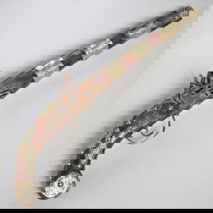 Antique Moroccan flintlock pistol: Antique Moroccan flintlock pistol, 19th c., with silver or white metal decoration, 18"l