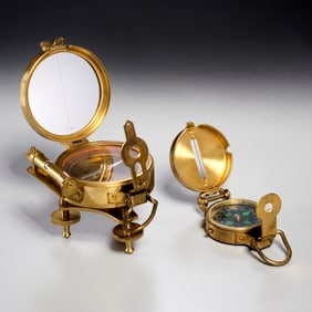 (2) Vintage brass compasses