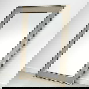 Large Uttermost contemporary wall mirror: Large Uttermost contemporary wall mirror, c. 2014, black and silvertone frame, beveled glass, 61.5"h x 41.5"w Provenance: The Collection of Placido Domingo