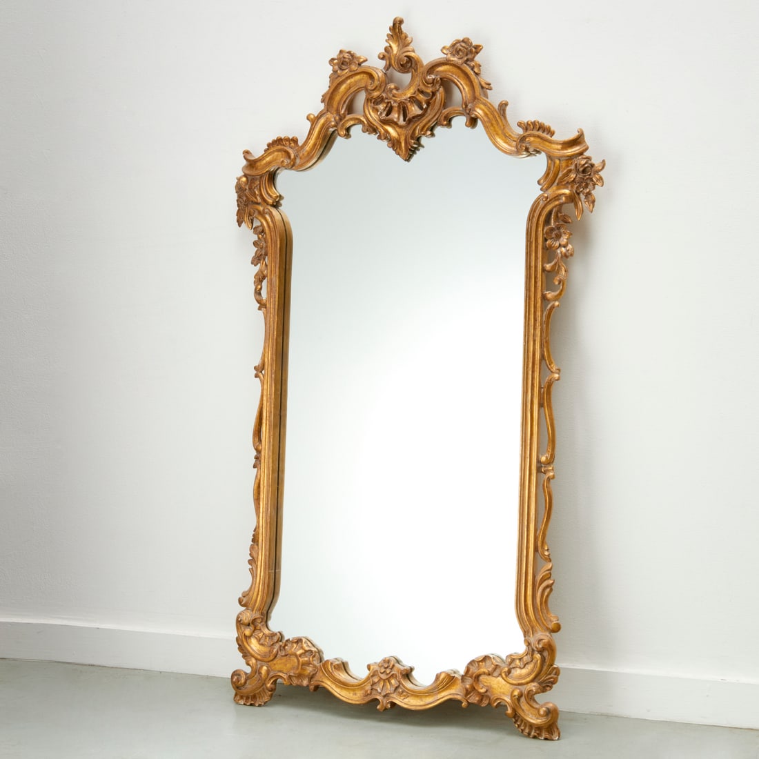 Louis XV style carved giltwood mirror: Louis XV style carved giltwood mirror, 20th c., unmarked, 56.5"h x 33"w Provenance: The Collection of Placido Domingo