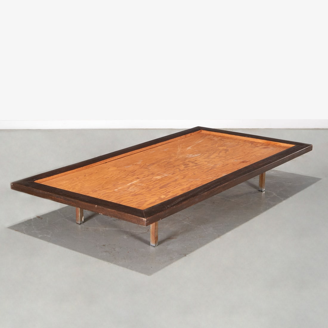 Amir Farr for Strick House, daybed: Amir Farr for Strick House, daybed, c. 1963, designed by Amir Farr for Strick House, stained Douglas fir on square steel legs, 11.75h x 74"l x 38.5"w