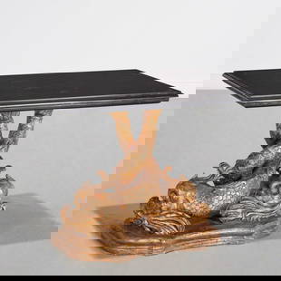 Venetian style carved giltwood "Grotto" table: Venetian style carved giltwood "Grotto" table, Mid 20th c., Italy, rectangular black marble top on double dolphin-form base, 21"h x 28"w x 20"d Provenance: The Iris Apfel Collection