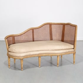 Antique Louis XVI style caned settee