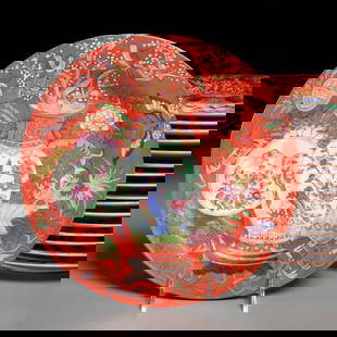 Set (17) Chinese Export porcelain dinner plates: Set (17) Chinese Export porcelain dinner plates, 20th c., iron red ground decorated with vase, basket, birds, butterfly, bat, and flowers, unmarked, 10.5"dia Provenance: The Iris Apfel Collection