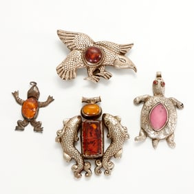 Group of silvered metal jewelry items