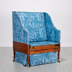 Unusual winged Campaign chaise longue