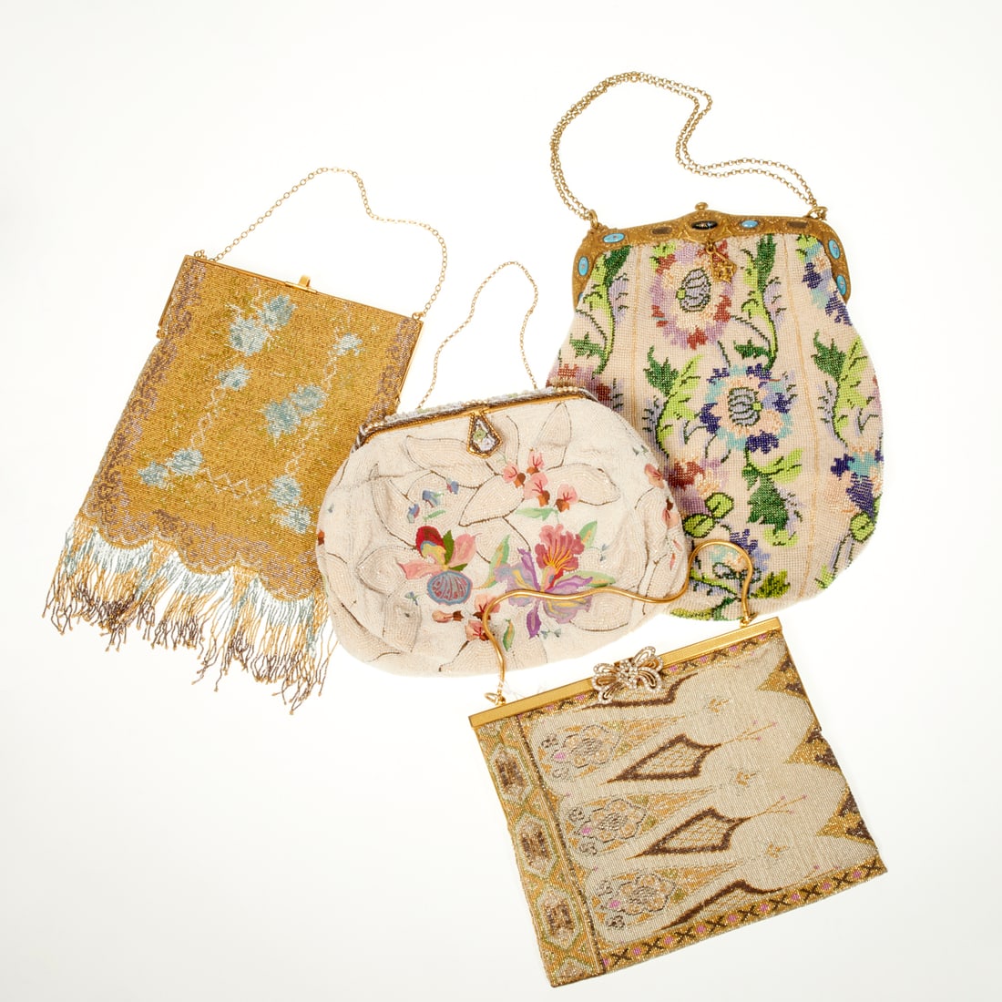 Selection of vintage micro bead handbags: Selection of vintage micro bead handbags, 20th c., Made in France, (1) white with multicolor flowers, seeded pearl trim frame, single chain strap, labeled Made in France, (1) pale pink gilt frame with