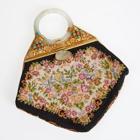 Needlepoint handbag with jade bracelet handle