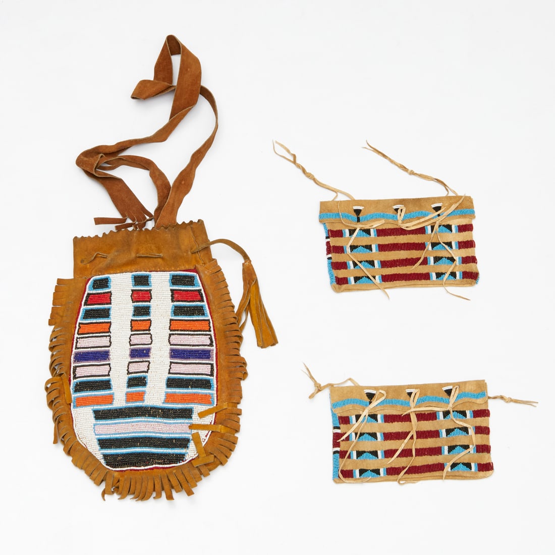 Pair Native American tipi bags and a pipe bag (1 of 4)