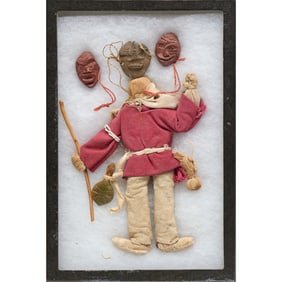 Native American doll with false face masks