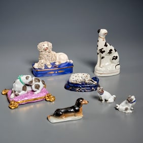 Group (7) French and German porcelain dogs