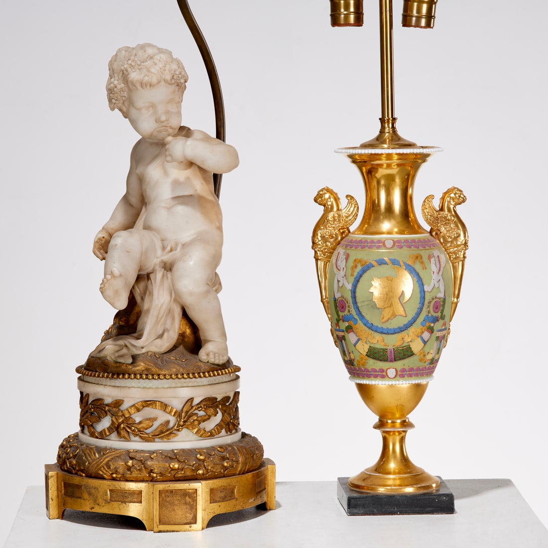 (2) Antique French porcelain, marble, bronze lamps: (2) Antique French porcelain, marble, bronze lamps, 19th c. and adapted, incl. a Napoleon III gilt bronze and carved marble bacchante lamp in the manner of Clodion, 18"h (to top of head), 31.75"h x 8.