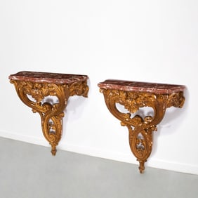 Pair Napoleon III giltwood wall-mount consoles