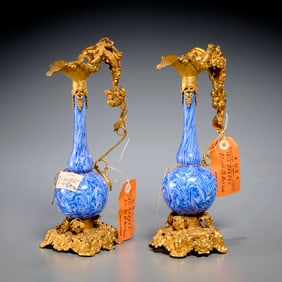 Nice pair Palais Royal gilt metal and glass ewers