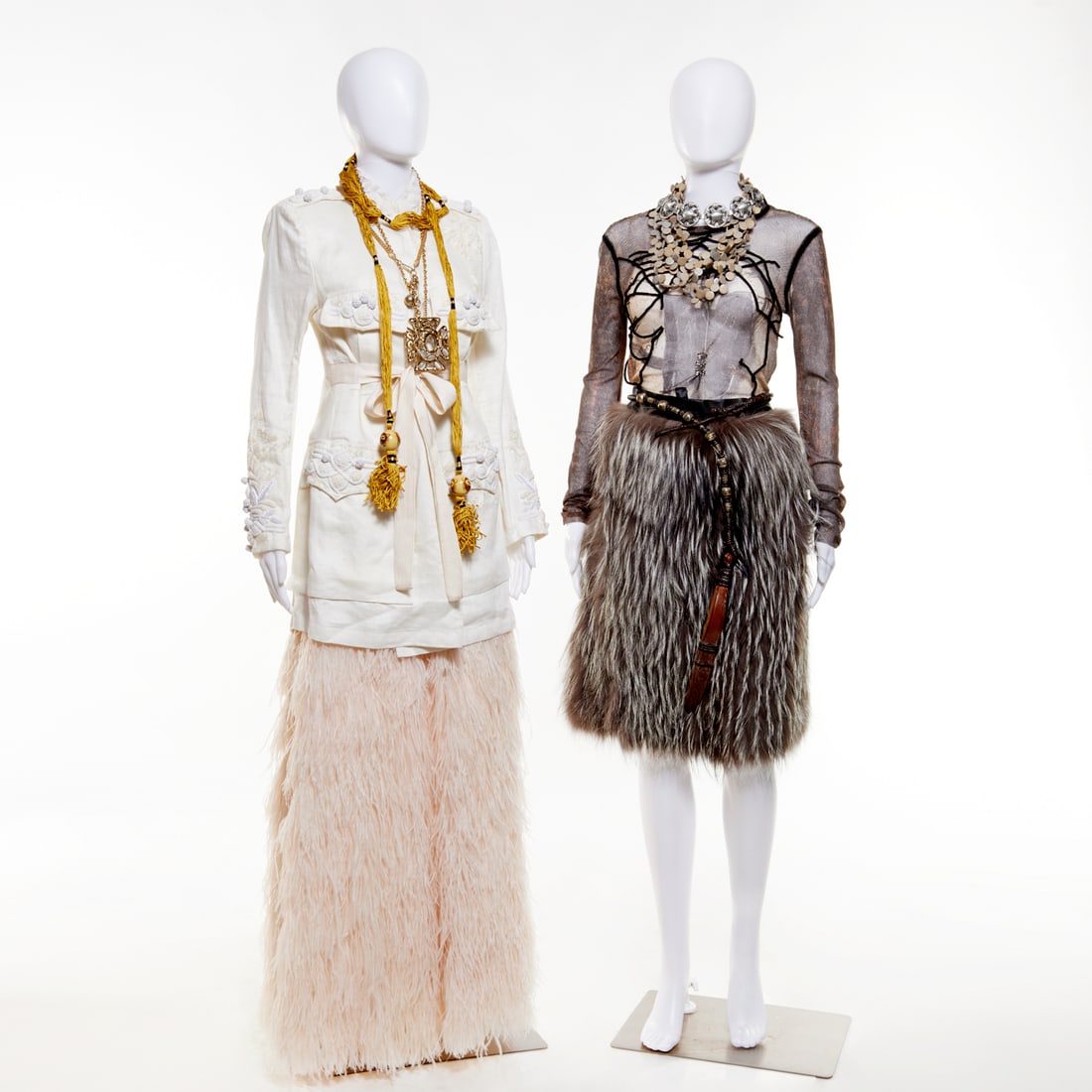 (2) Feathered skirt ensembles: (2) Feathered skirt ensembles, 21st c. (1) Alice & Olivia by Stacey Bendel long ostrich feather skirt, size 4, banded waist, 43"l, (1) Dries Van Noten linen jacket, (1) Michael Kors faux fur short ski